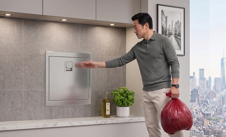 Person using kitchen chute in condo